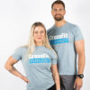 CrossFit Furuset, Mann og kvinne avbildet forfra, iført en lys blå t-skjorte med logoen til CROSSFIT Furuset over brystet